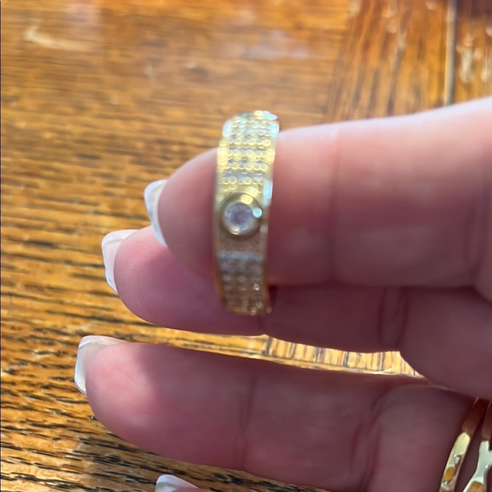 Gold and Silver Pavé Band Ring with Sparkling Stones.